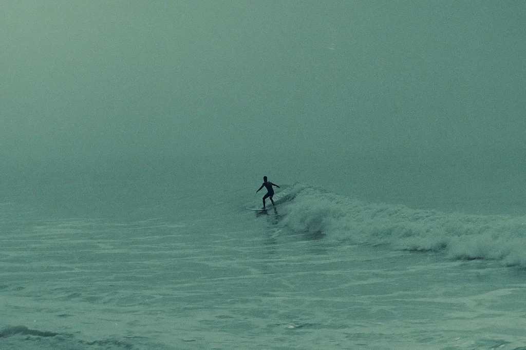 Person surfing a wave