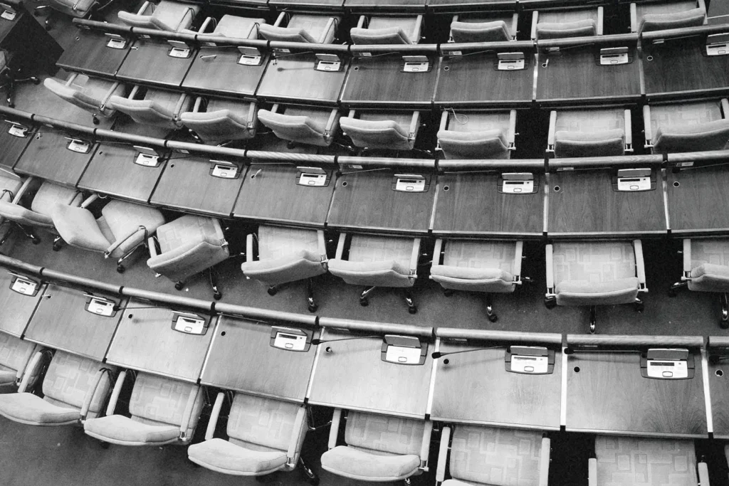 black and white photo of the empty senate seats