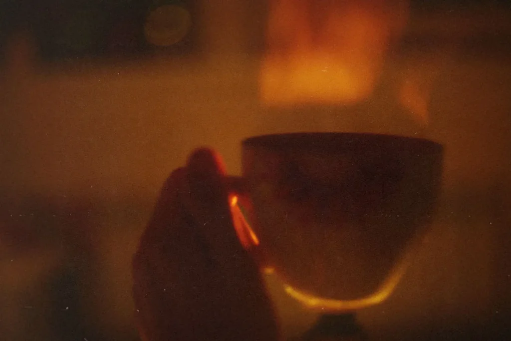 Hand holding coffee mug