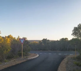 Empty road with a yield sign