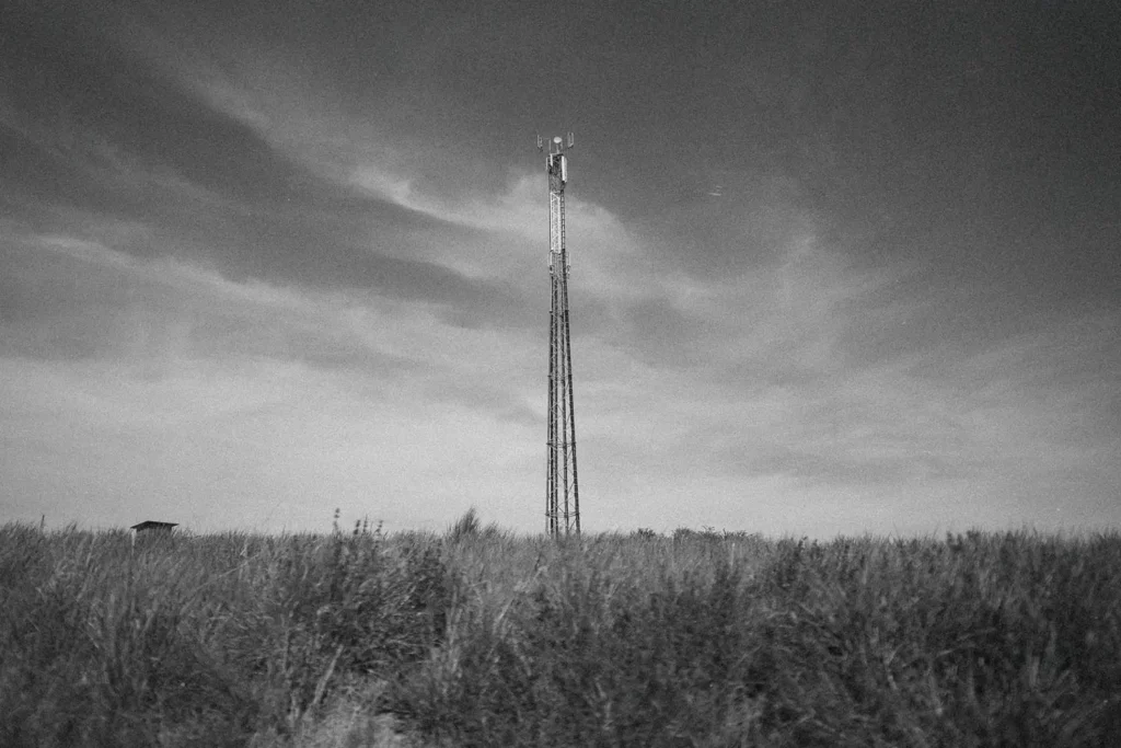 radio pole in an empty field