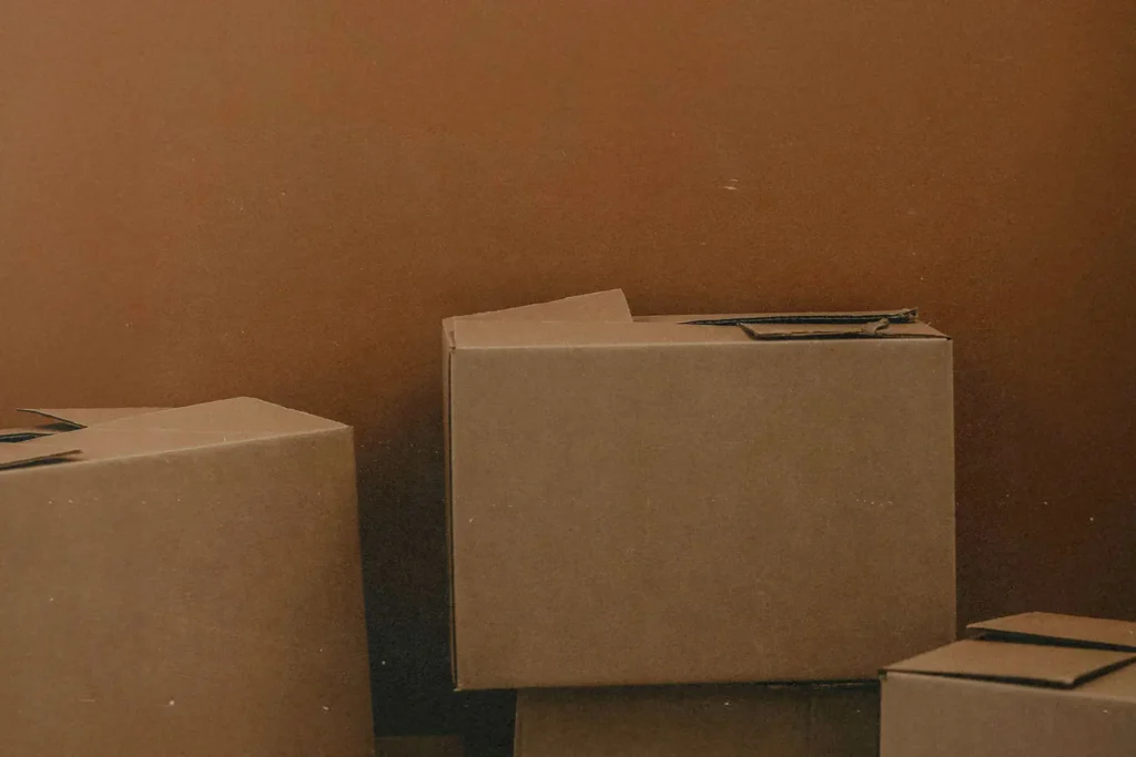 pile of closed cardboard boxes