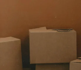 pile of closed cardboard boxes