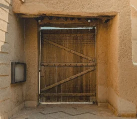 Entryway with a wooden door