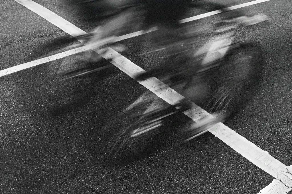 Blurry image of two bikers