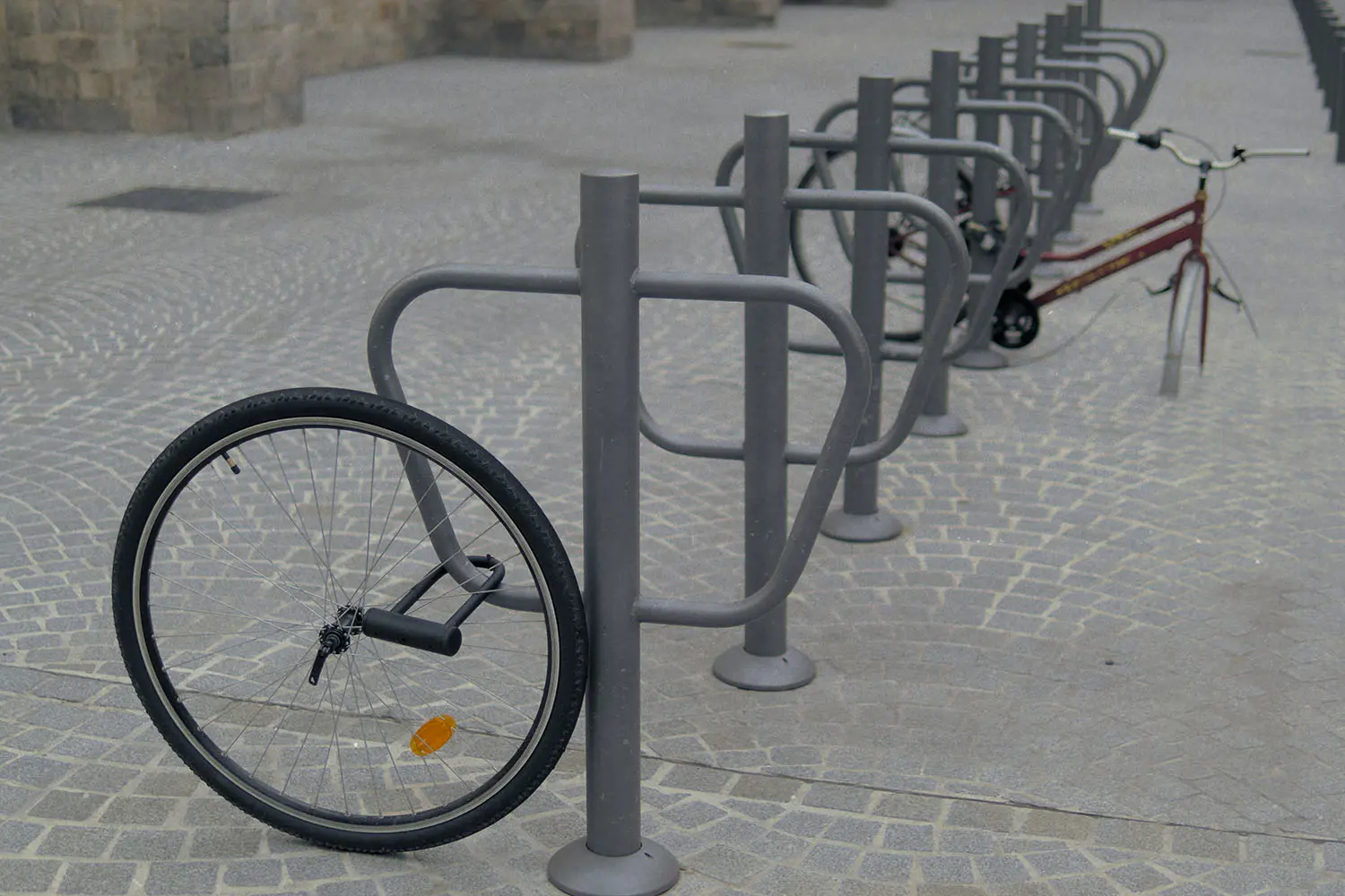 Wheel attached to a bike rack