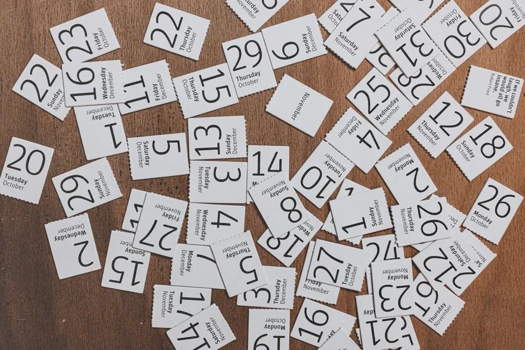 Table full of papers with dates