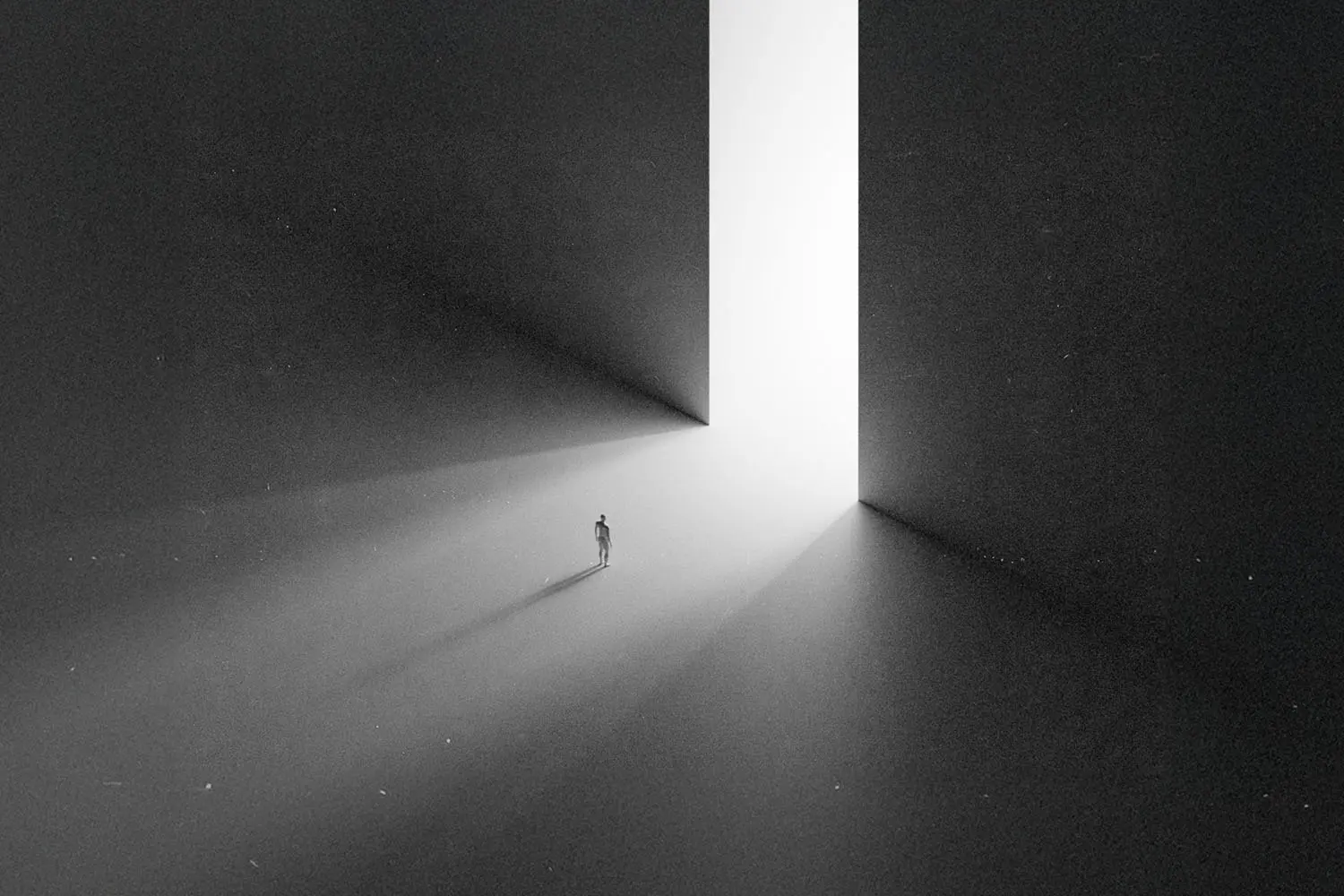 A small figure stands alone in a vast dark space, walking toward a towering doorway filled with bright white light