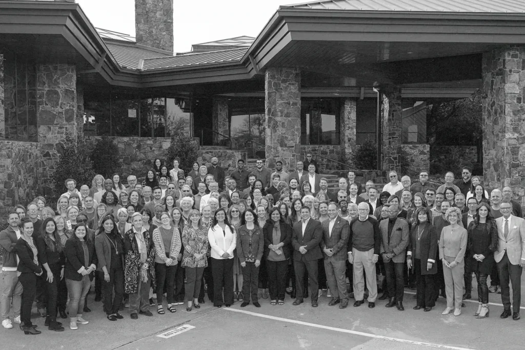 Group photo of KCM and EMIC staff