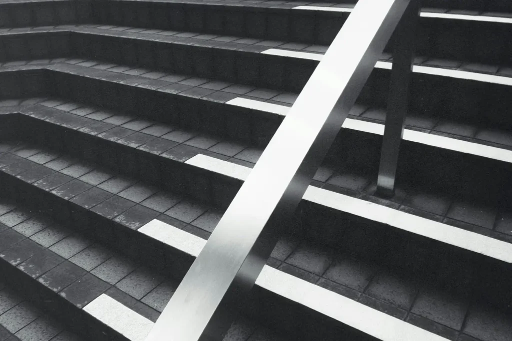 Steel rail and concrete staircase