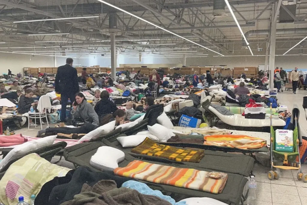 Room full of beds for refugees