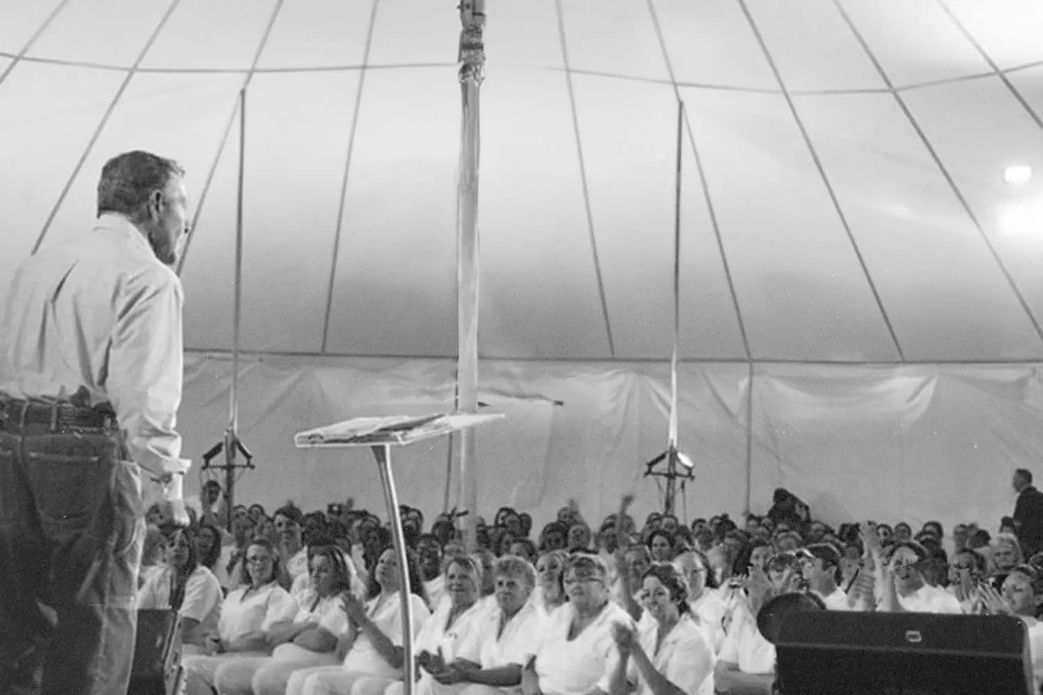 Kenneth Copeland speaking to an audience of inmates