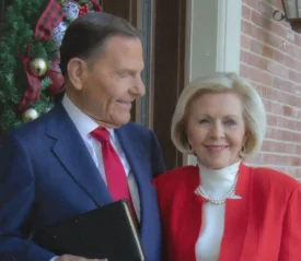 Kenneth Copeland looking at Gloria Copeland smiling