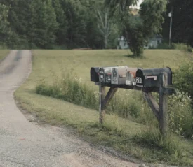 row of mailboxes on a rural road