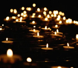 candles lit in the darkness