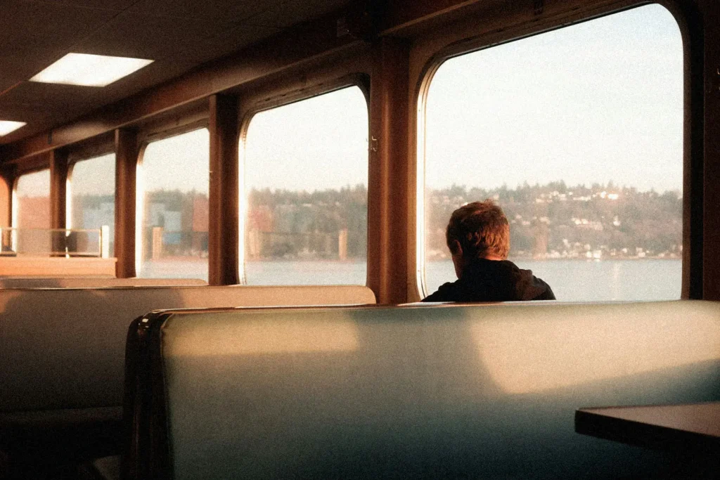 man sitting on train