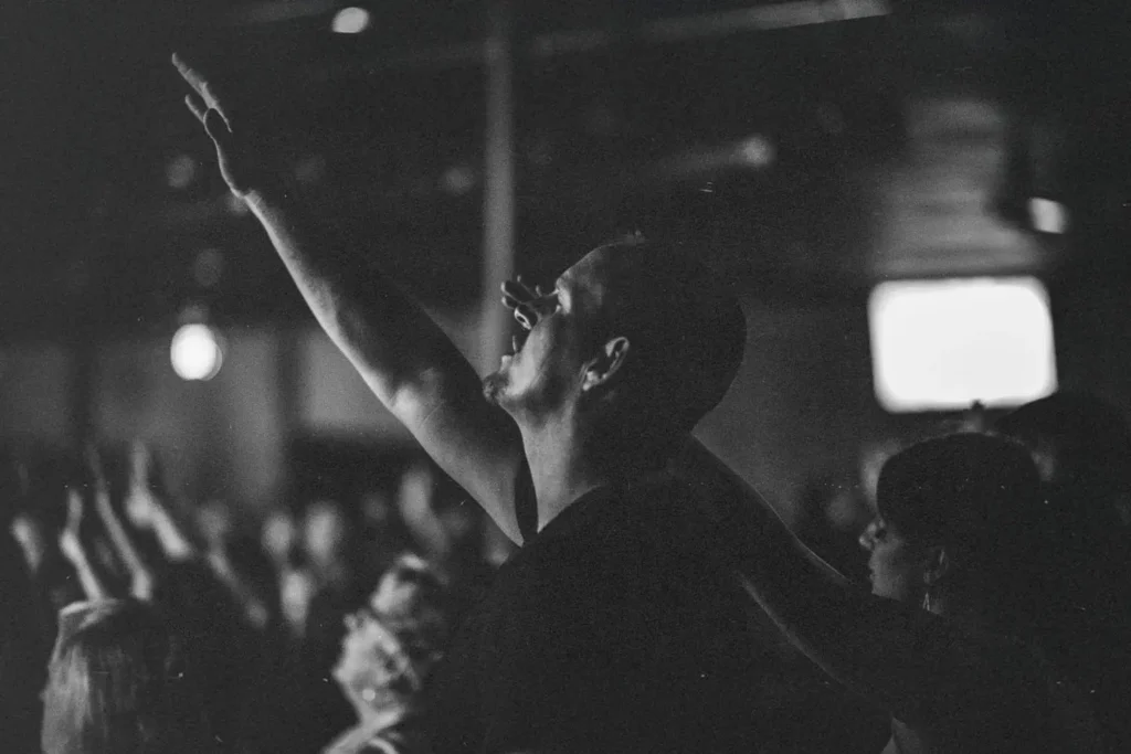 Man lifting hands in worship