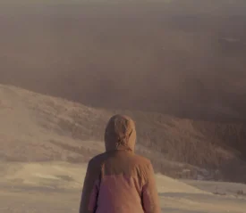 Woman looking out to the ocean