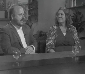 Chris and Sara Eberhardt sitting and talking