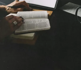 hands on open bible, reading