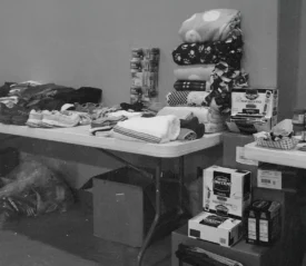 black and white photo of donations on a table