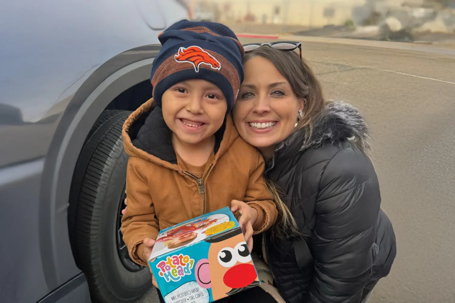 Hannah Minor with a child while ministering with KCM Partners in Arizona