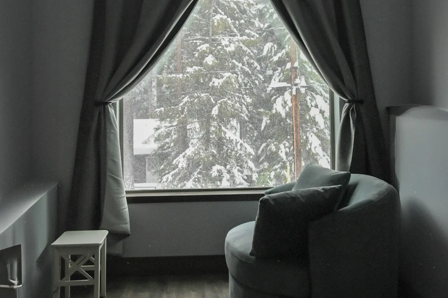 Looking out a snowy window from the living room, representing God who cares about His people.