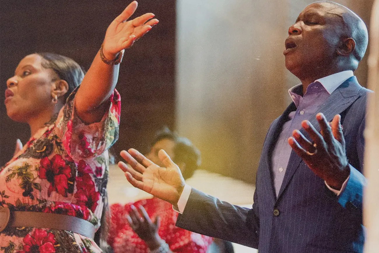 Edgar and Elsie Neluvhalani worshipping in their church in South Africa.