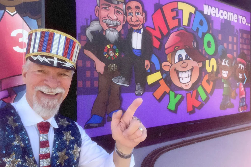 Dr. Terry Horn in front of a new screen for his children's urban ministry.