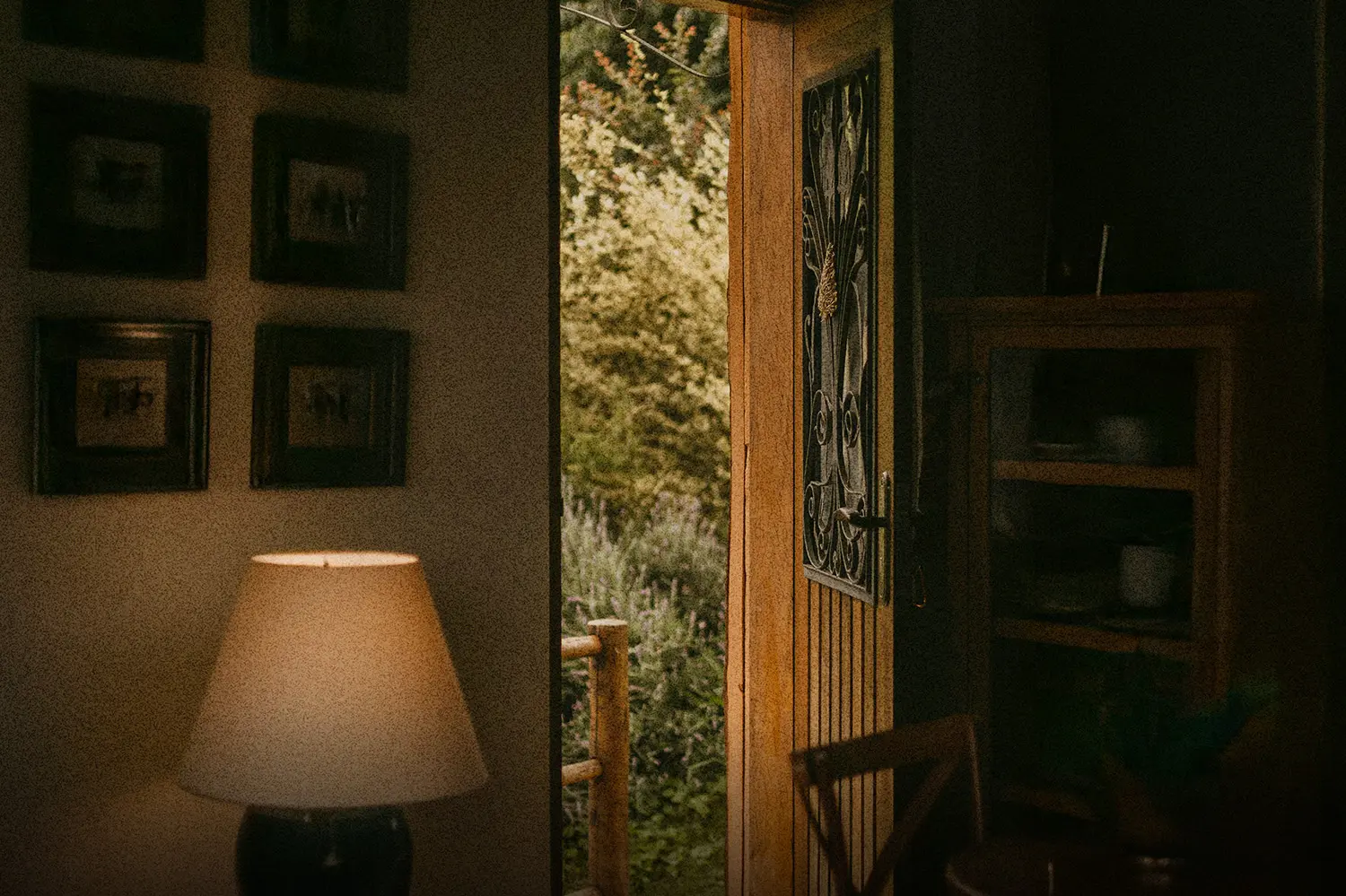 A quiet room with an open door leading outside, symbolizing faith and trust that God is in control even when the future is unseen and life feels uncertain.